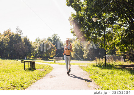 healthy lifestyle young fitness woman running 38853584