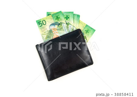Black wallet with Swiss Francs on white background Black wallet with Swiss Francs on white background 38858411