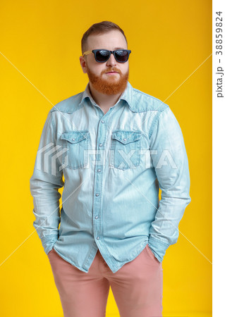 beard man in sunglasses and denim shirt 38859824