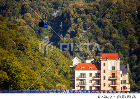 Image of buildings at foot of mountains 38859826