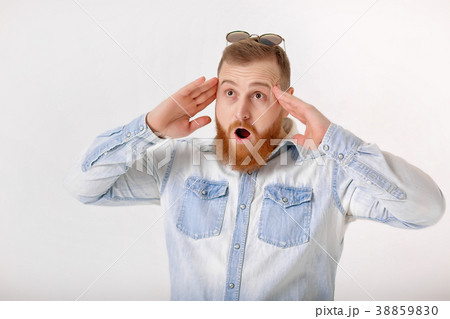 beard man in sunglasses and denim shirt 38859830