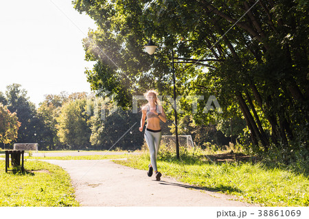 healthy lifestyle young fitness woman running 38861069