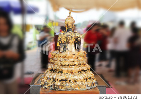 Buddha meditating on a lotus base 5 step. 38861373
