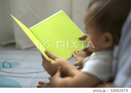 Mother and baby reading a fable tale story 38862679