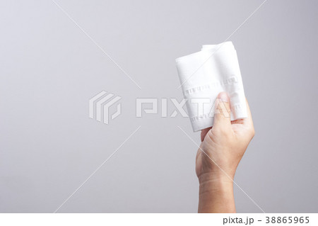 Hand holding tissue paper Hand holding tissue paper 38865965