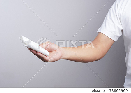 Hand holding tissue paper Hand holding tissue paper 38865969