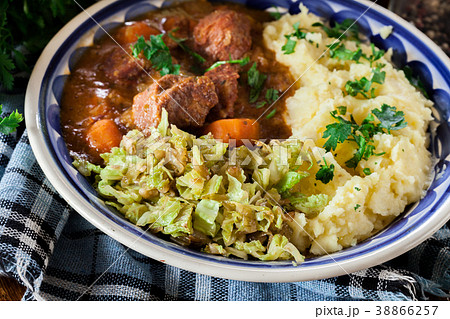 Traditional irish stew served with potatoes Traditional irish stew served with potatoes 38866257