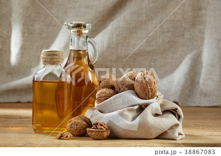 Aromatic oil in a glass jar and bottle with 38867083