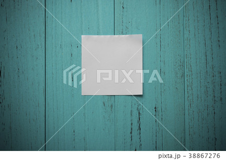White note paper on grungy wood table 38867276