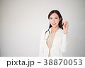Beautiful asian woman female doctor on white 38870053