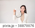 Asian woman female doctor holding sthetoscope 38870076