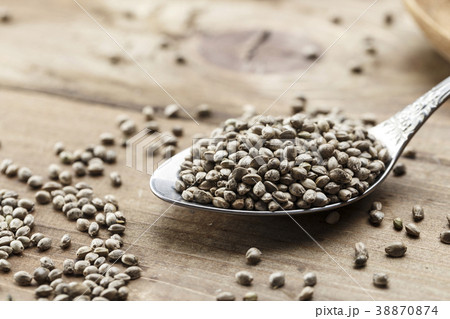 hemp seeds in a metal spoon hemp seeds in a metal spoon 38870874