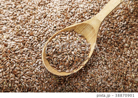 Flax seeds scattered Flax seeds scattered 38870901