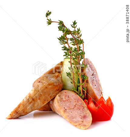Sliced sausages decorated with cherry tomato Sliced sausages decorated with cherry tomato 38871408