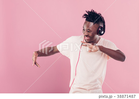 African-American man in headphones listening to African-American man in headphones listening to 38871487