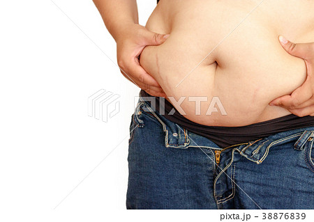 Woman trying to wear jeans. Woman trying to wear jeans. 38876839