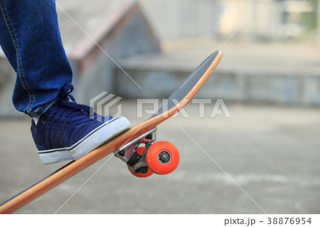 skateboarder legs skateboarding on skatepark ramp 38876954