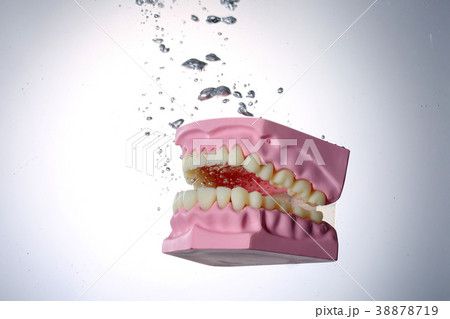 Spread, various objects in water and air bubbles over white background. 043 38878719