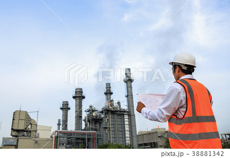 Engineer is checking gas turbine power plant Engineer is checking gas turbine power plant 38881342
