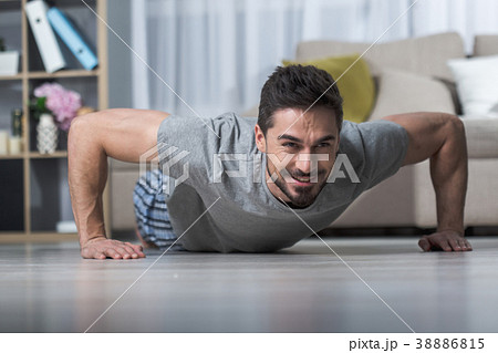 Cheerful young male working out 38886815