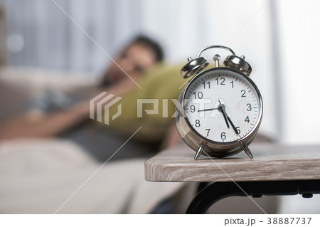 Peaceful male sleeping at home 38887737