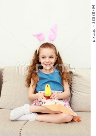 Cute little girl with bunny ears and cuddly toy 38888794