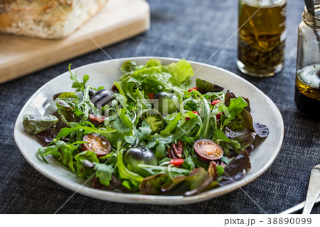 Green Salad with Green Tomatoes and Pecan Salad 38890099