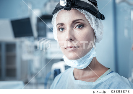Success responsible medic standing and looking Success responsible medic standing and looking 38893878
