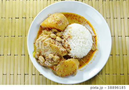 chicken curry and potato with rice on plate chicken curry and potato with rice on plate 38896185