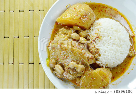 chicken curry and potato with rice on plate chicken curry and potato with rice on plate 38896186