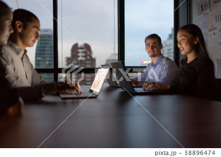 Business people team working late night. 38896474