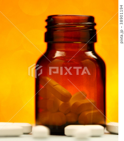 Pill bottle from white pills 38901194