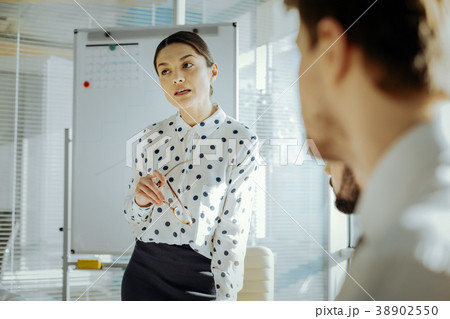 Charming young woman expressing her opinion during 38902550