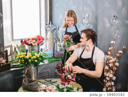 photo of florists working in pairs photo of florists working in pairs 38903582