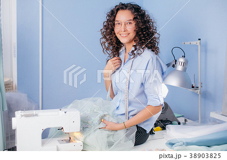 dressmaker sitting on the table with creased 38903825