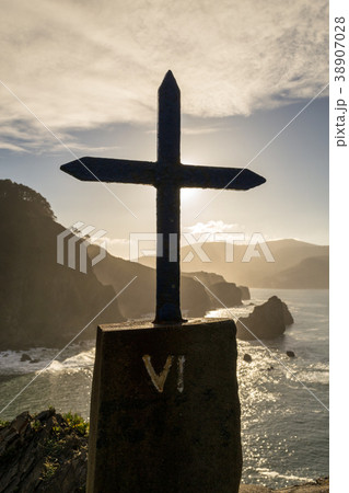 Crucifix covering the sun 38907028
