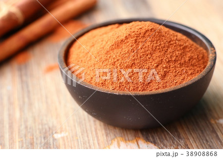 Cinnamon powder and stick 38908868