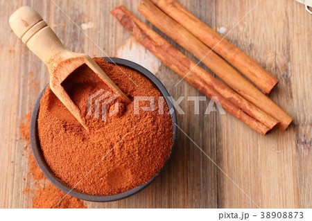 Cinnamon powder and stick 38908873