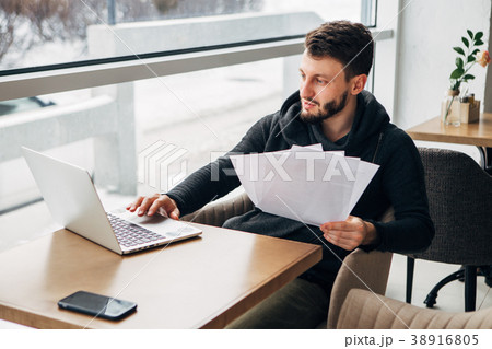 Concentrated Young Bearded Businessman Wearing Concentrated Young Bearded Businessman Wearing 38916805