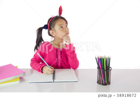 dreamy child girl with pencils.  38918672