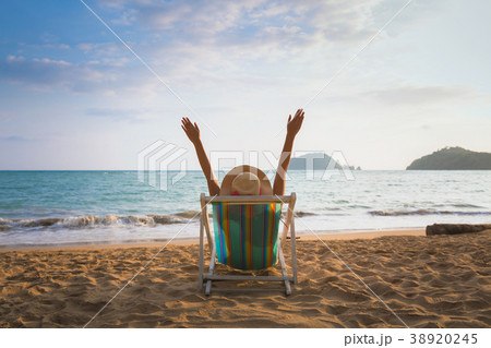 Woman on beach in summer 38920245