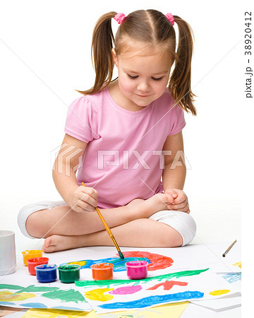 Cute cheerful child play with paints Cute cheerful child play with paints 38920412