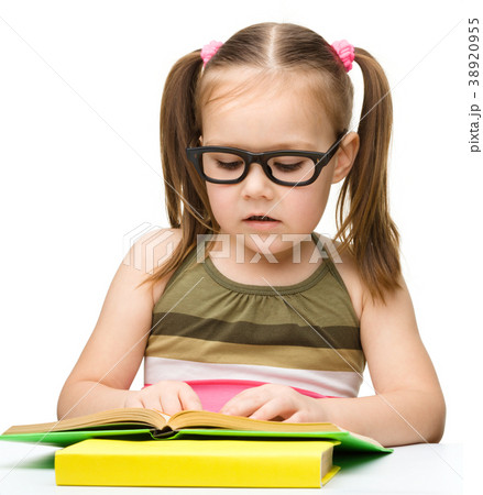 Cute little girl reading book Cute little girl reading book 38920955