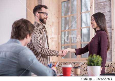 Joyful positive people greeting each other Joyful positive people greeting each other 38922763
