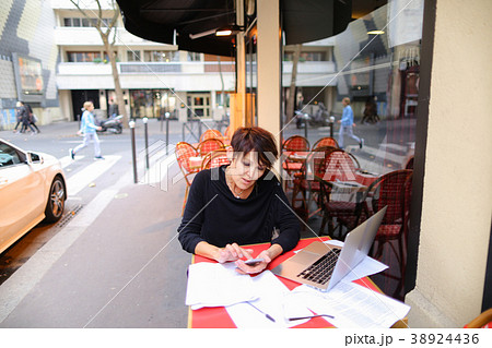 aged female teacher working in open air with 38924436