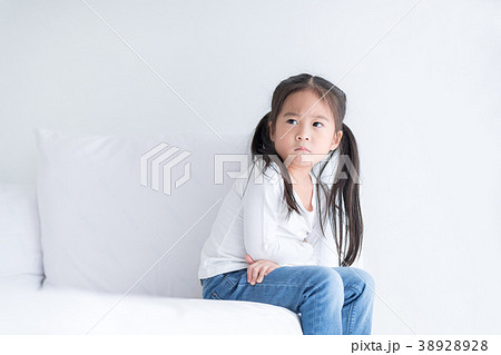 Lonely kid is sitting alone at the morning. Lonely kid is sitting alone at the morning. 38928928