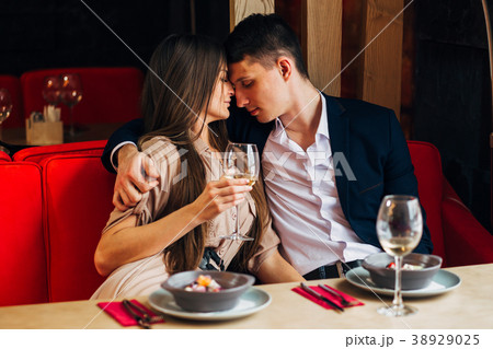 Happy young couple taking selfie with smart phone Happy young couple taking selfie with smart phone 38929025
