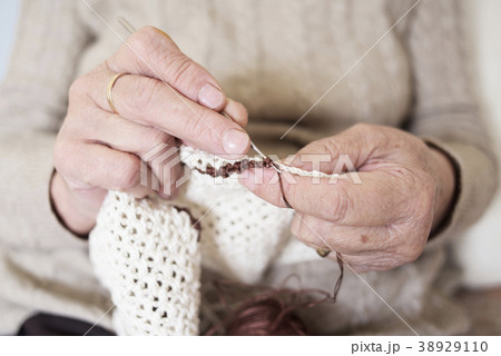 old caucasian woman crocheting old caucasian woman crocheting 38929110
