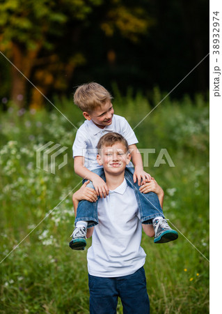Two brothers having fun Two brothers having fun 38932974