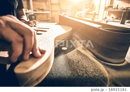 Manufacture of guitars. 38935181